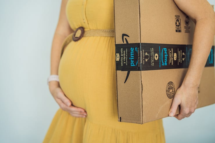 Woman holding amazon package