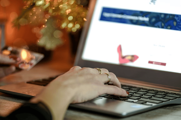 hand touching laptop